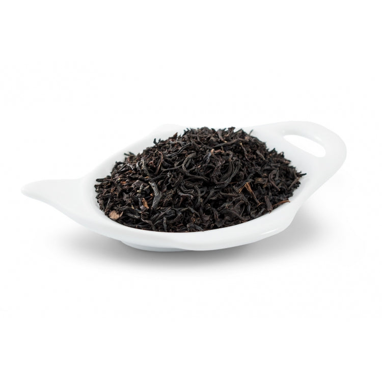 svart te Te med rund, söt smak av grädde.