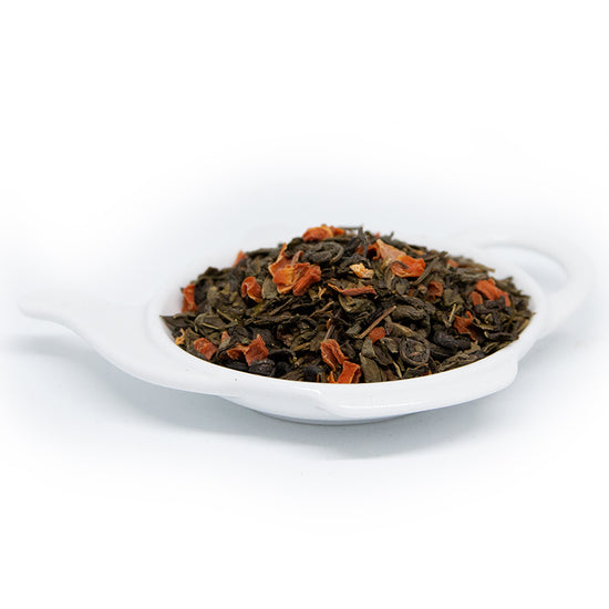 grönt Te smaksatt med exotiska frukter och vanilj. Dekorerad med morotsbitar som också bidrar till teets söta toner.